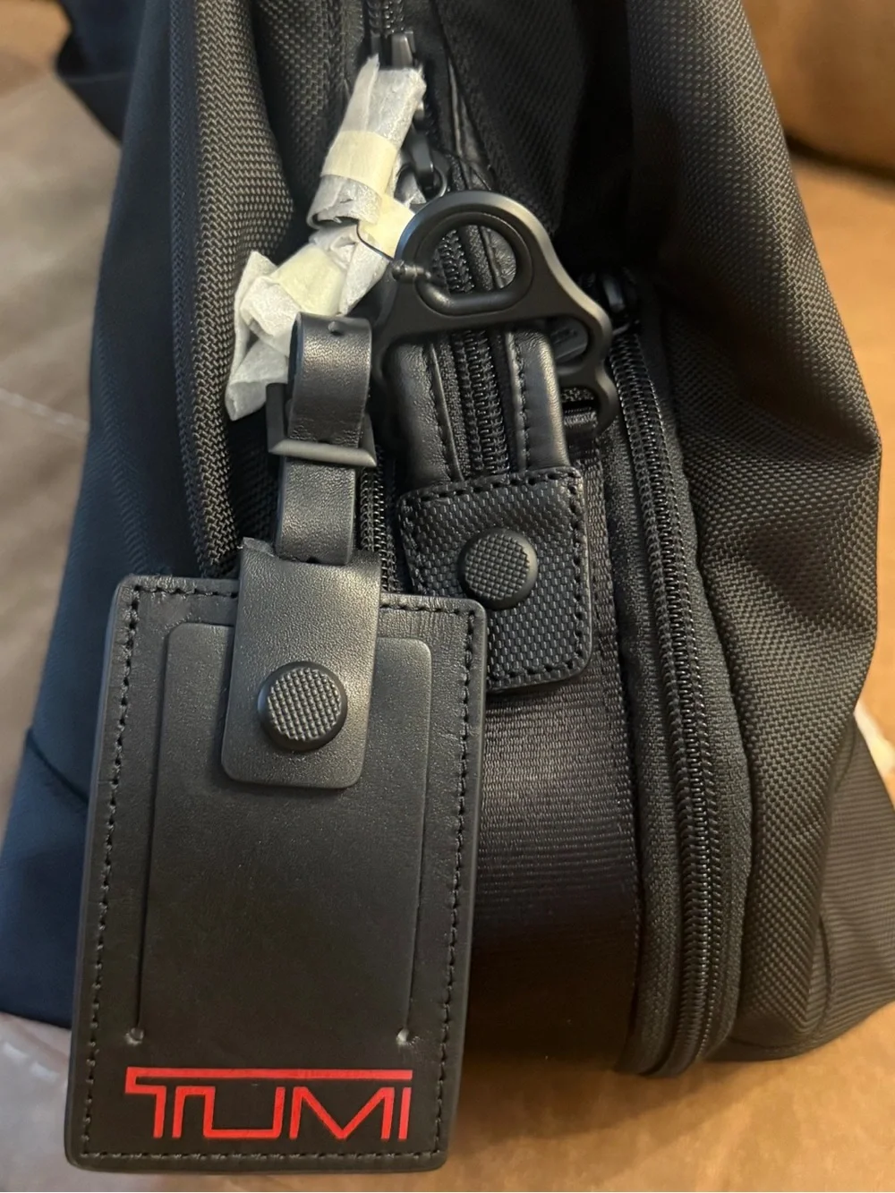 Tumi impressive 13